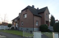 Dachausbau und Sanierung eines 2-Familienhauses